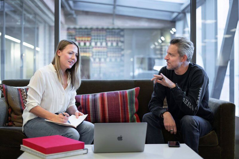 man-and-woman-talking-on-the-sofa