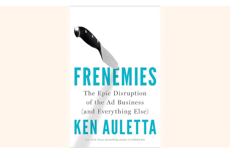 a book cover with a knife sticking out of it