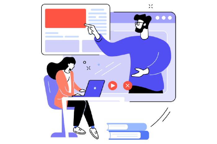 a man and a woman sitting at a table with a laptop preview image